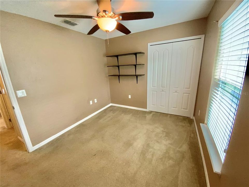 Primary Bedroom w/Barn Door to Bathroom