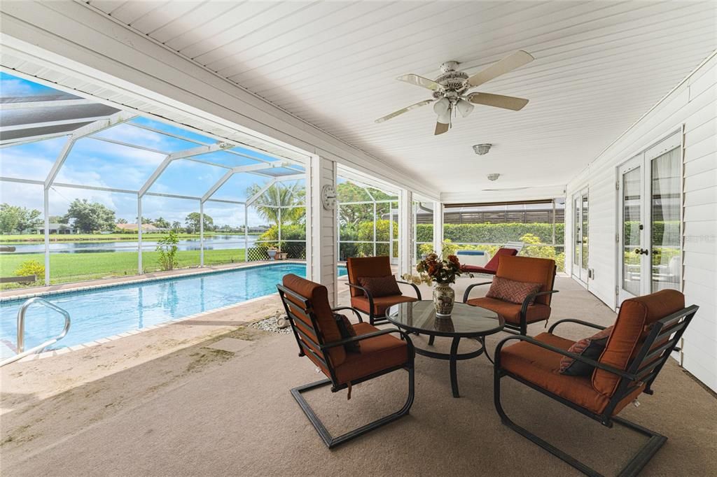 Spacious covered lanai with gorgeous view of the lake