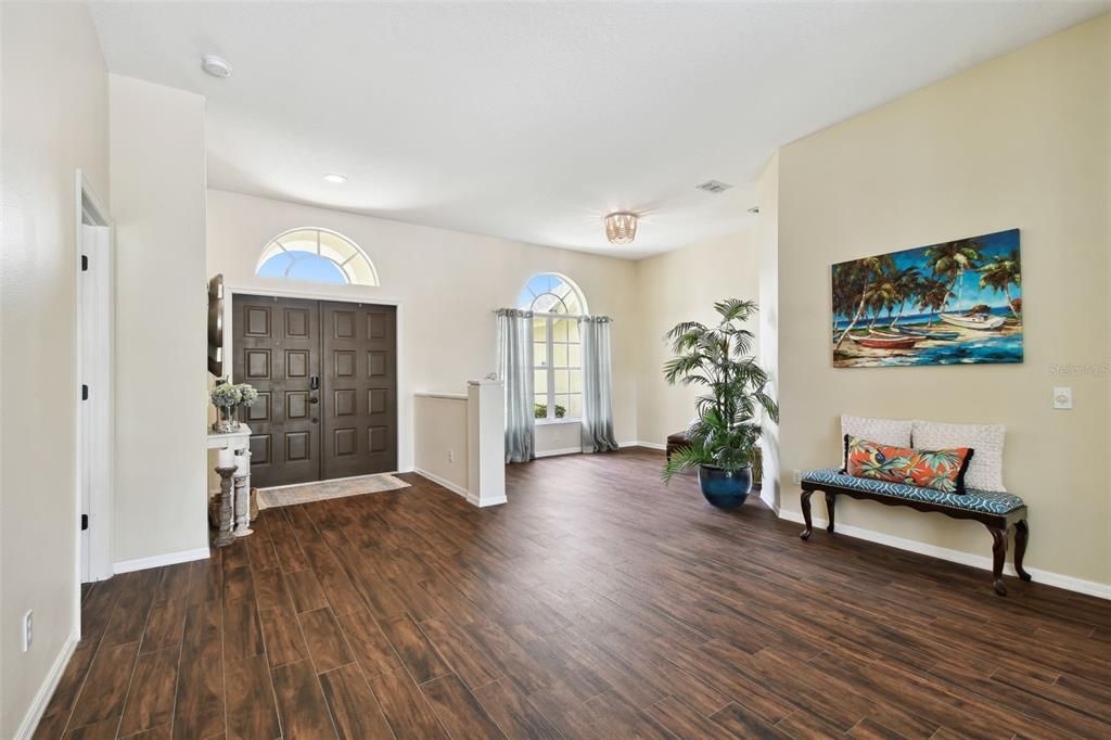 Formal Sitting Room facing the Formal Dining Room and Entry Way