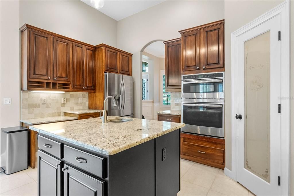 Kitchen with Island and Secondary Desk Area