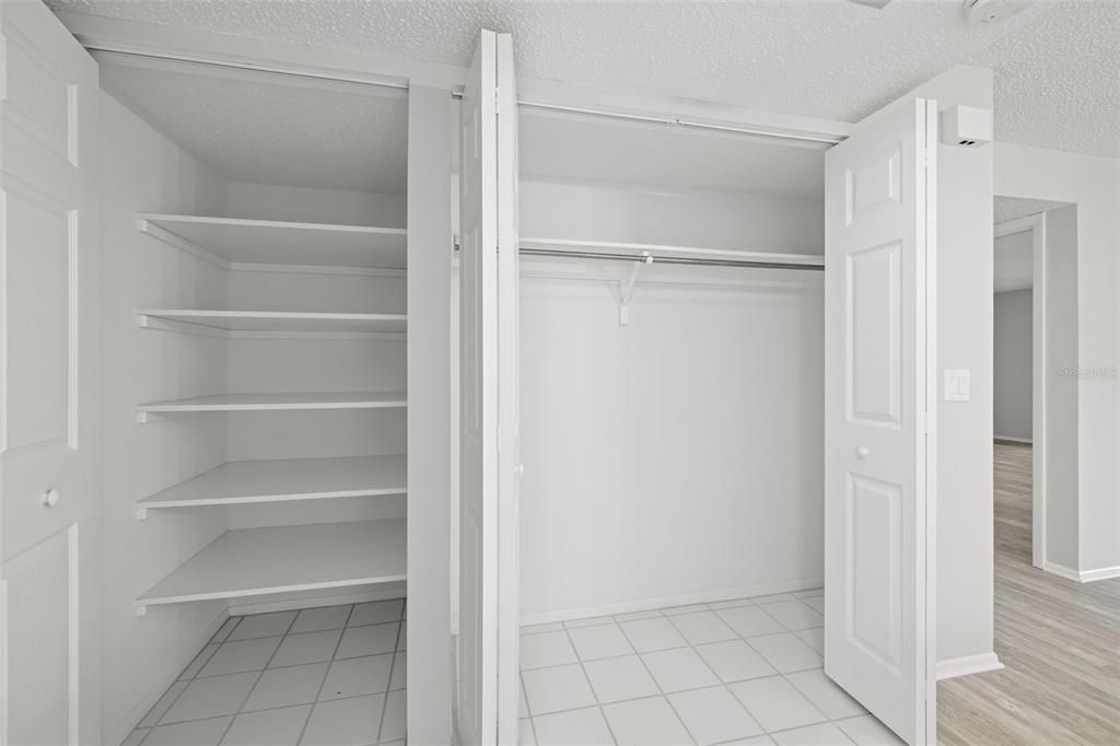 Front foyer storage, deep shelving and closet