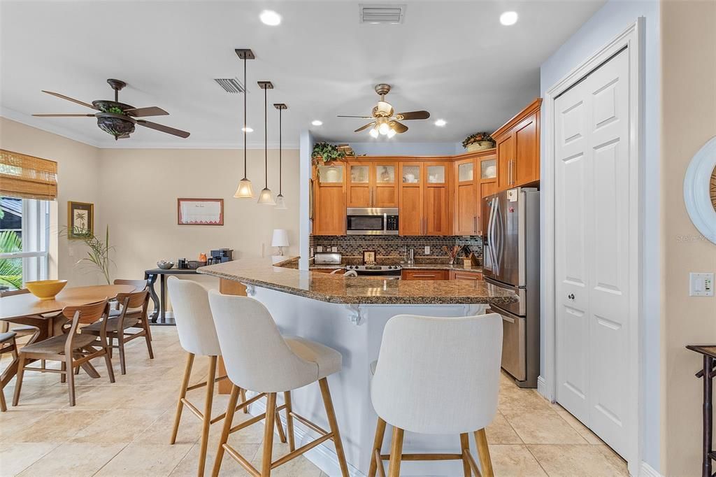 The kitchen has bar top seating and a pantryGourmet kitchen with bar top seating