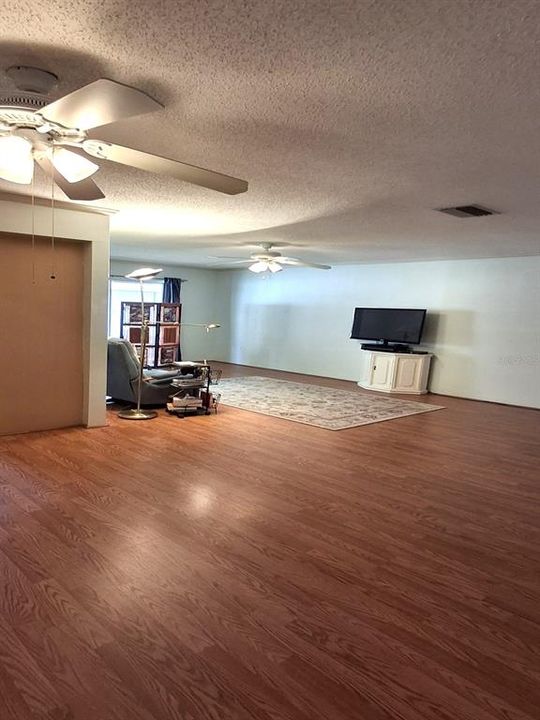 Standing in dining room looking towards living room