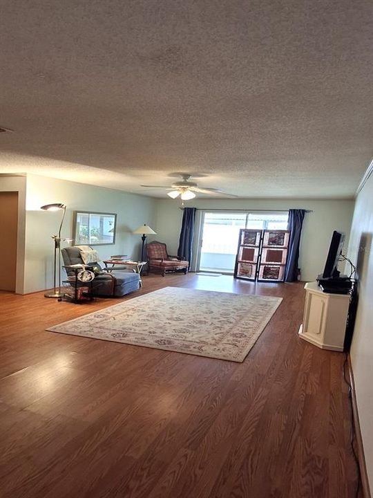 View when walking in front door-Living Room - sliding glass door leading to lanai