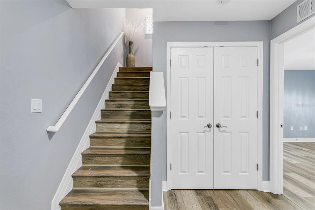 The first floor foyer is complete with an additional storage/coat closet.