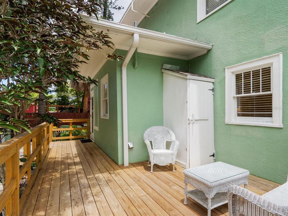 Wood deck at rear of home.