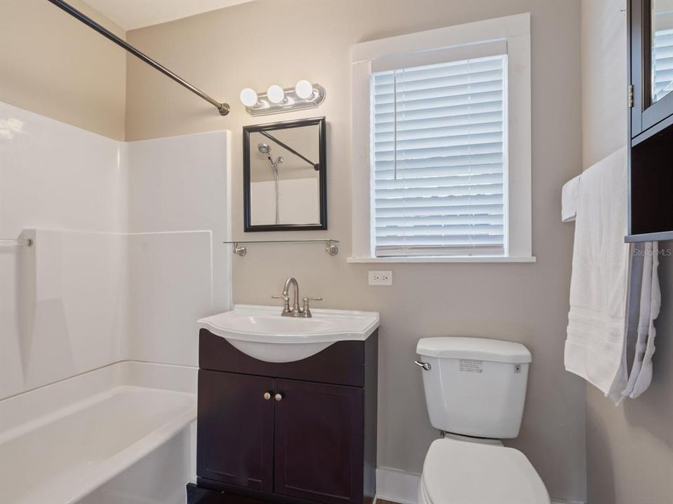 Apt. 1 - bathroom with tub/shower.