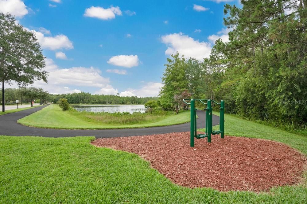 Walking Trail around pond across the street from Clubhouse