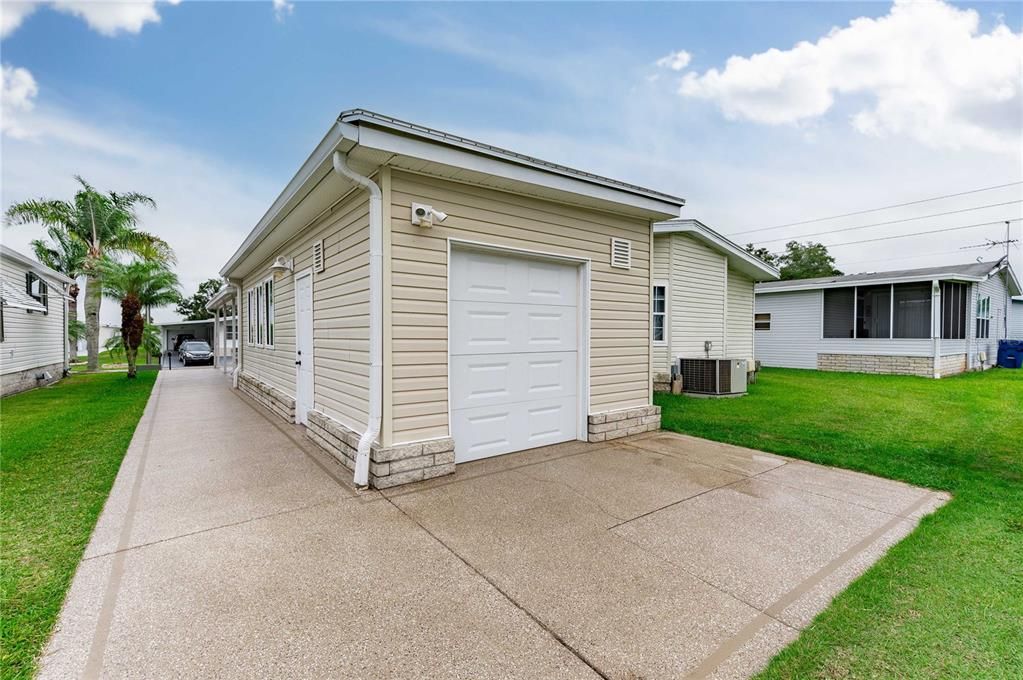 Golf cart garage in back of home.