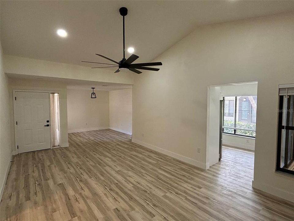 Living Room w/ view of Front door/ dining area