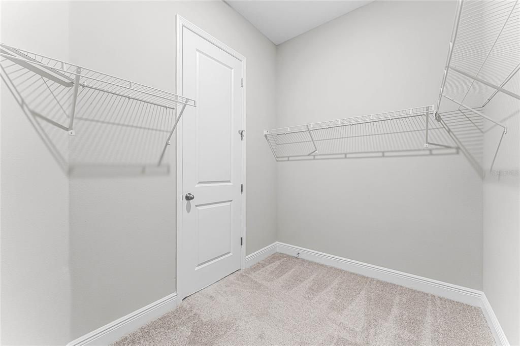 Primary Bedroom Walk in Closet