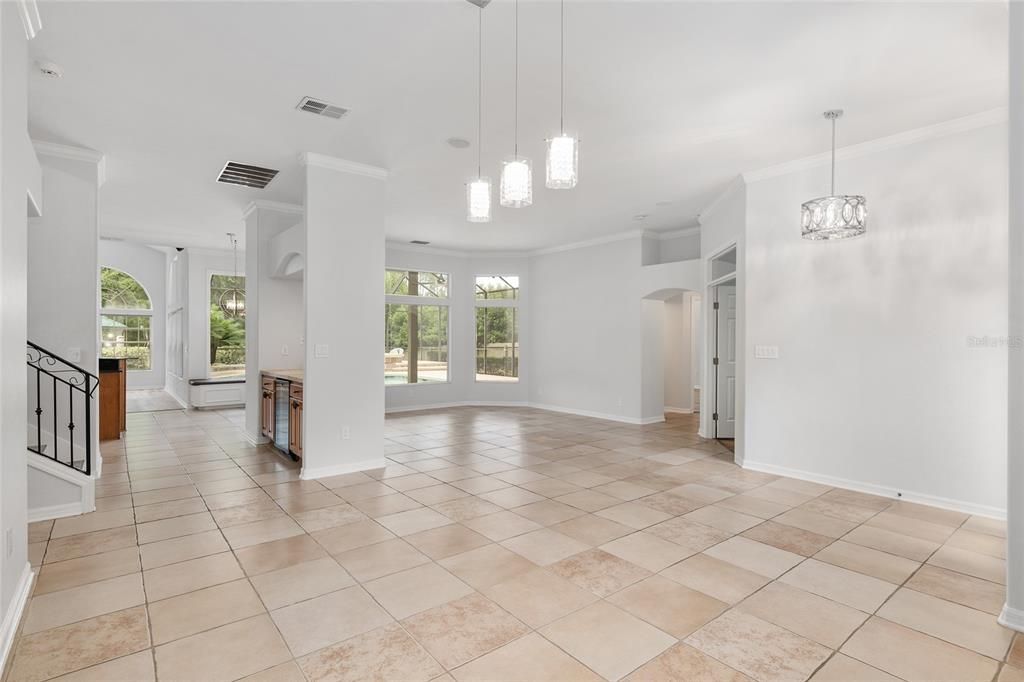 LOOKING FROM DINING ROOM INTO FORMAL LIVING ROOM