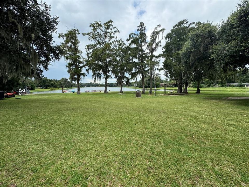 Silver Springs Shores Community Center Lake with kayaks available to guests.