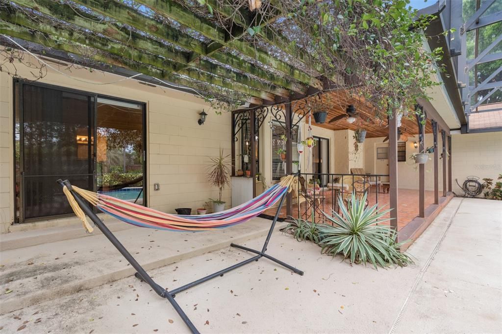 Private covered lanai outside primary bedroom