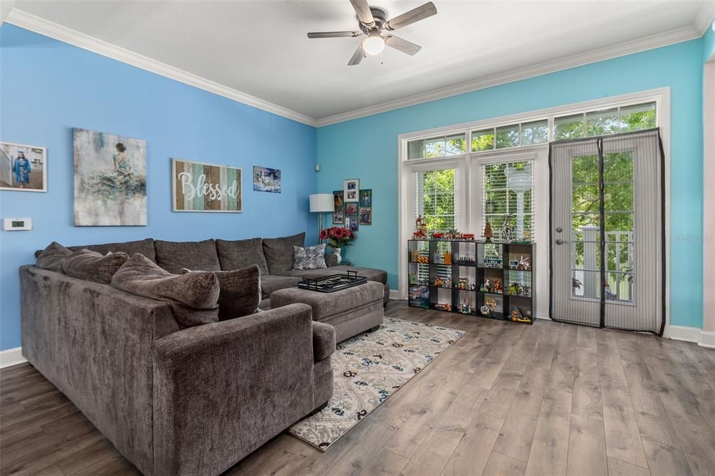 A spacious Living Room with Crown Molding