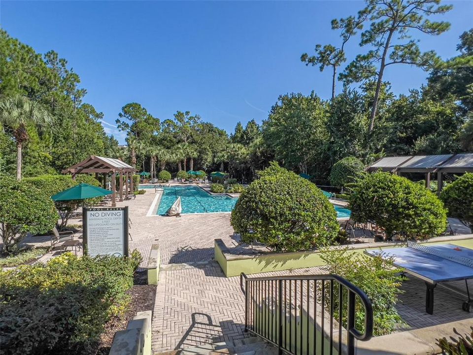 A clubhouse with a resort-style heated pool and waterfall spa