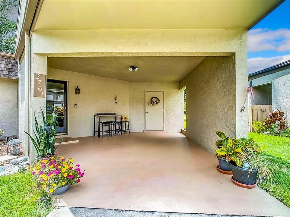 FRONT ENTRANCE AND CARPORT