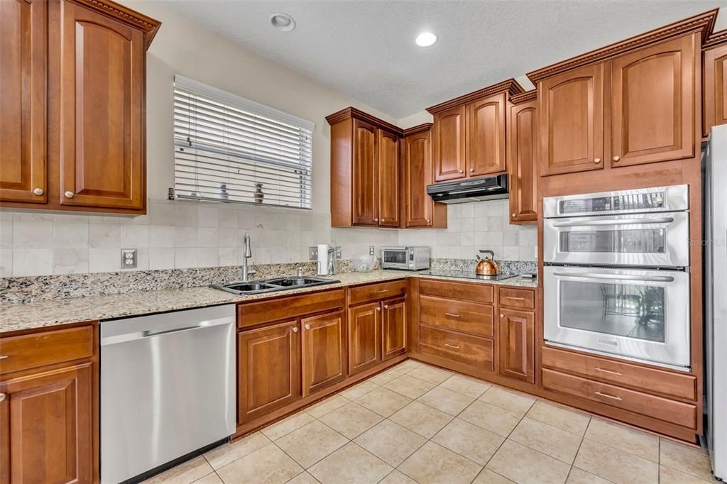 Kitchen with built-in double ovens