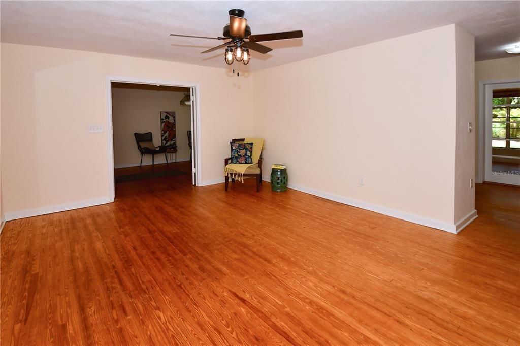 Living Room to Foyer and Kitchen