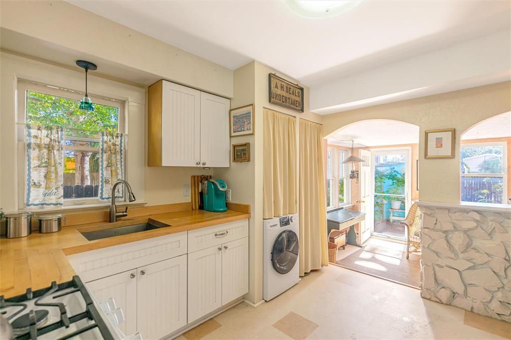 Laundry in Kitchen - doorway to living room and back deck