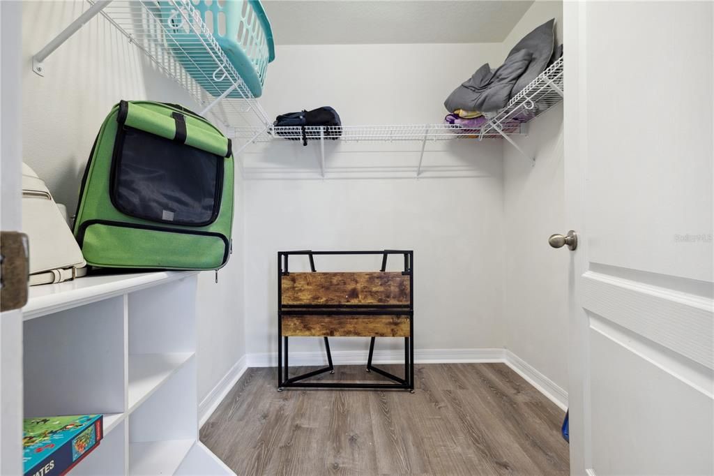 Large walk-in closet in girls room