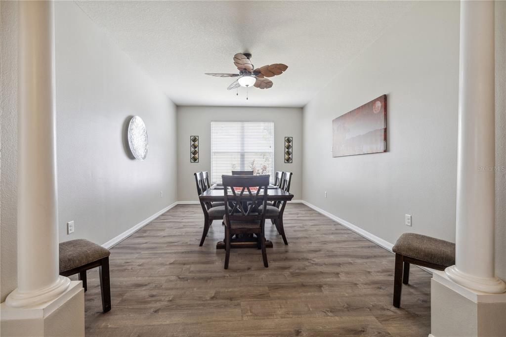 Dining room is large enough to hold a good-sized table and 8 chairs, plus a hutch or buffet