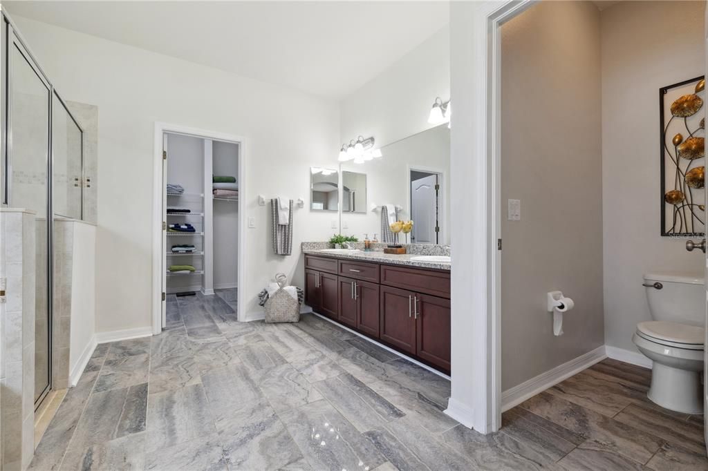 Double vanity and water closet