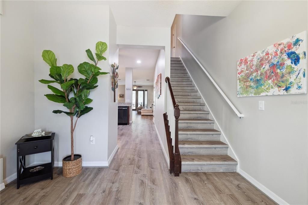 View from foyer to open kitchen/great room area