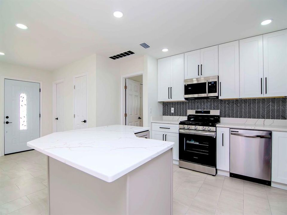 New cabinets with quartz countertops