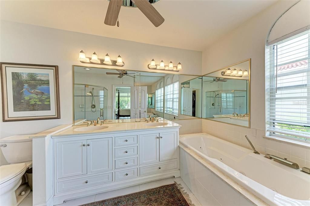 Primary Bathroom with jet tub and dual sinks