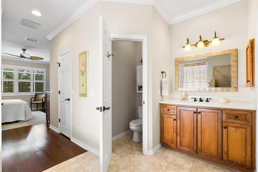 Owners ensuite bathroom featuring dual vanities, a garden tub, and a walk-in shower.