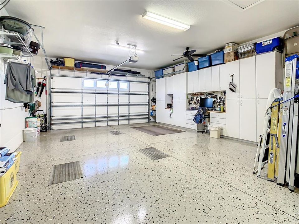 GARAGE WITH CABINETS AND EPOXY FLOOR