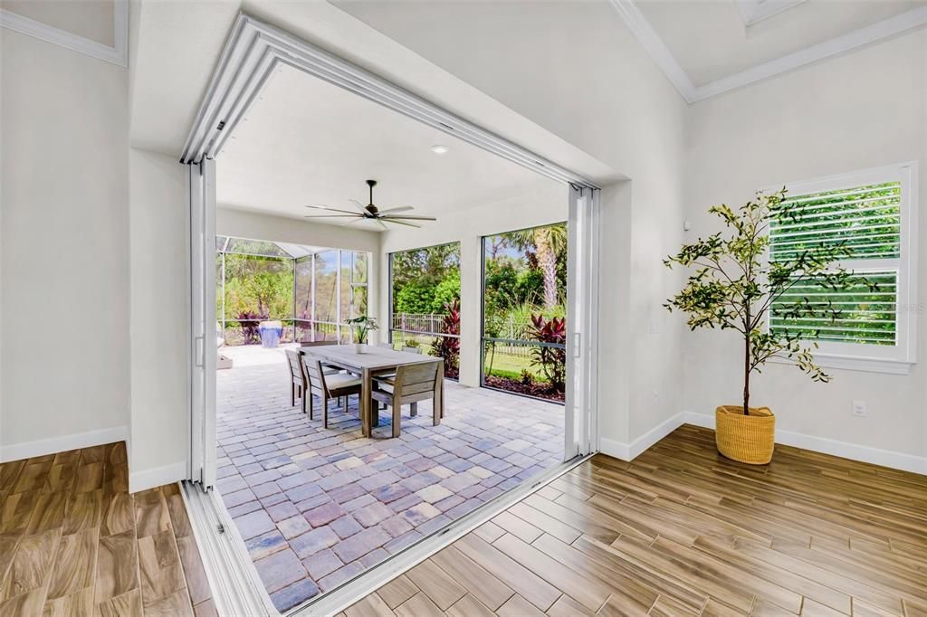 ZERO corner sliding door opens great room to the lanai