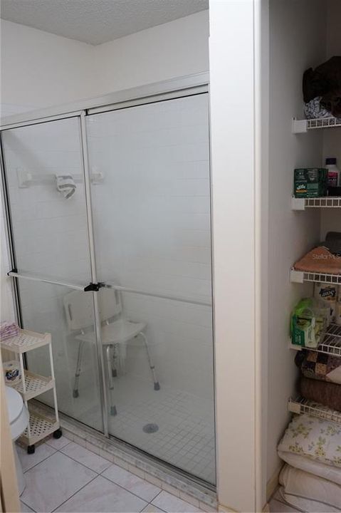 owners shower and linen closet