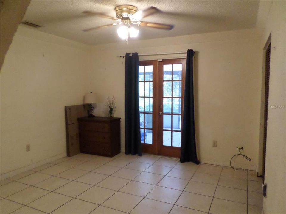 FAMILY ROOM FENCH DOORS OPENS TO SCREENED PORCH  12X19