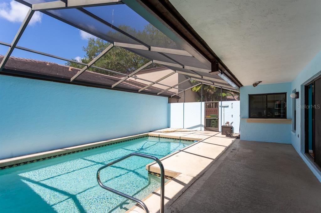 Pool, with pass-through kitchen window