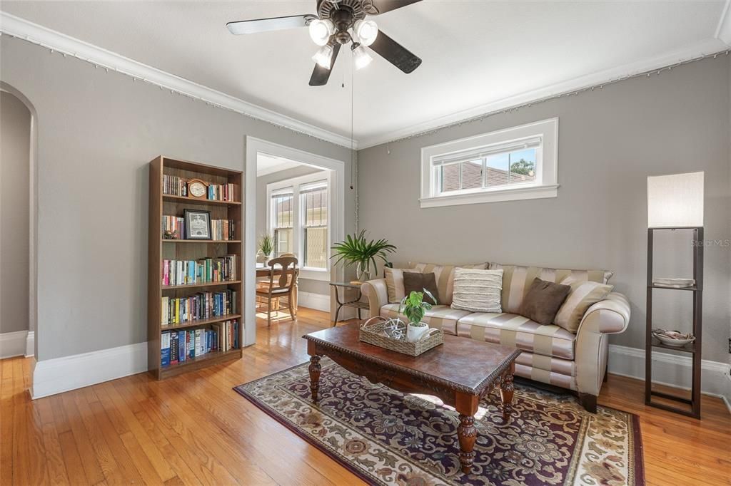 Living room with transom window allowing plenty of natural light while maintaining privacy