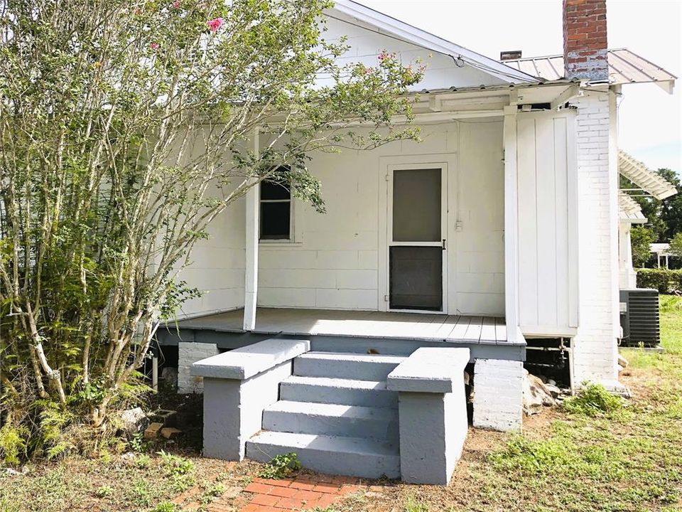 REAR OF HOME AND DOUBLE GARAGE