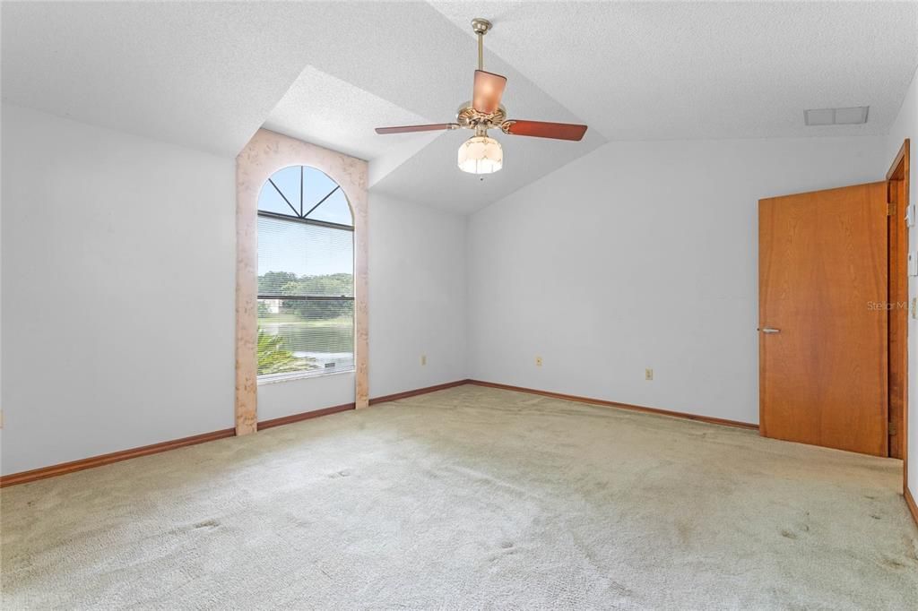 Master bedroom suite, high ceilings, overlooking water