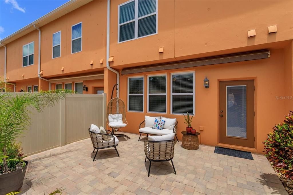 Private courtyard includes new 17 x 11 retractable awning