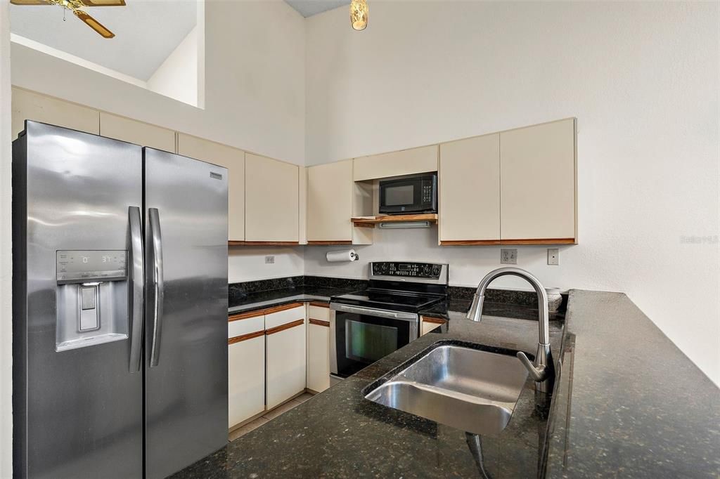 kitchen with stainless steel appliances and granite counters