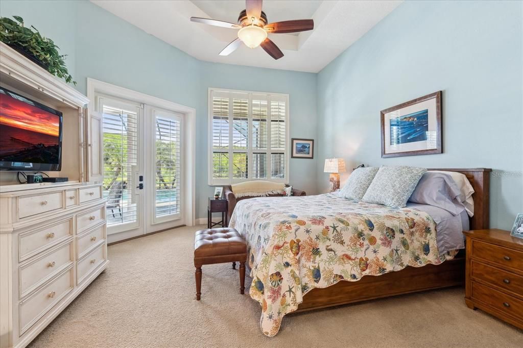 Primary bedroom with french doors to lanai