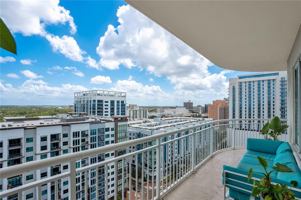 The wrap around balcony features breathtaking views of both Lake Eola & the downtown Orlando City Line making this your ideal escape for your morning coffee or favorite evening libation.