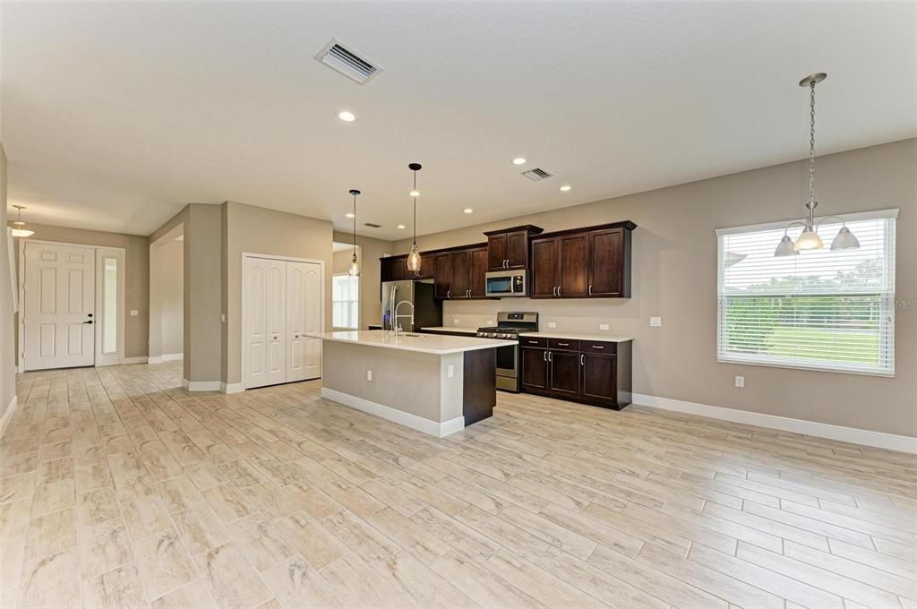 Kitchen and front door on left