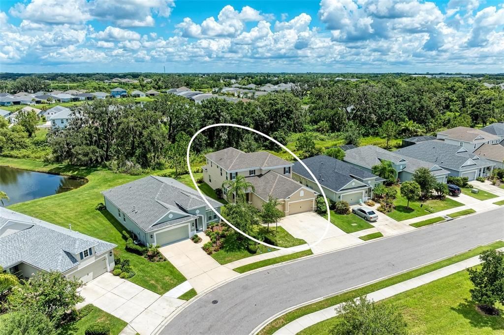 Aerial of home to show preserve behind home