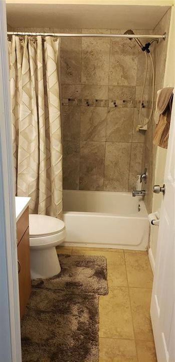 hall bathroom with upgrades tile