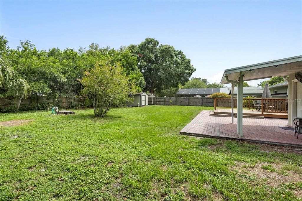 Fenced in Backyard with double gate on one side