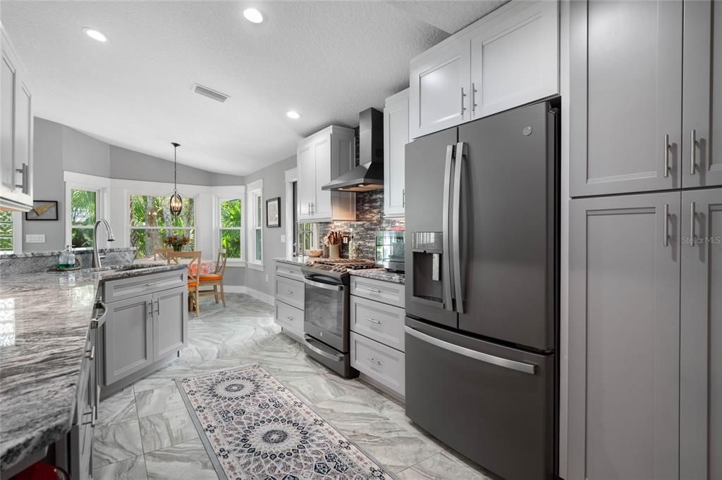 Kitchen with counter-depth refrigerator