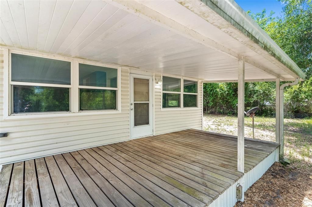 Large back porch- overlooking State owned green space- No rear neighbors!