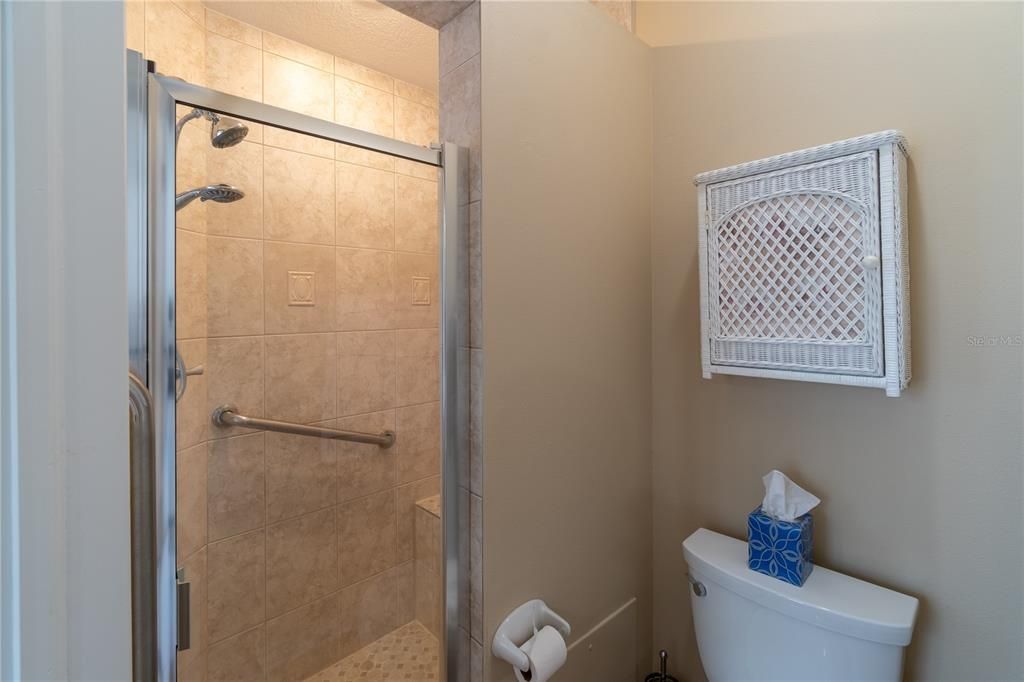 Large walk in shower with seat